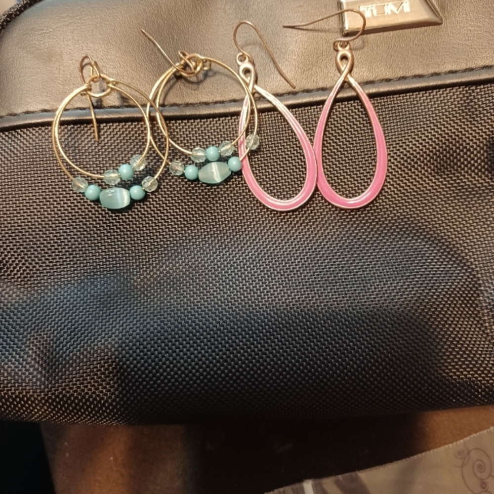 Earring from 2000 from needing a new home still look brand new never worn